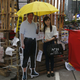 A woman poses with a cardboard cut out of Xi Jinping at the Umbrella Movement protest site in Mong Kok.